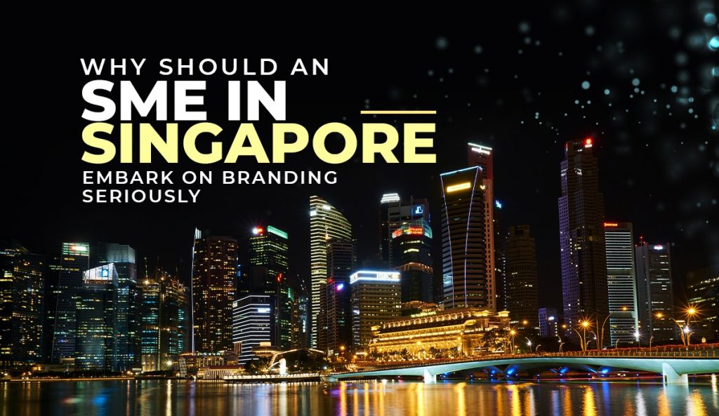 buildings in Singapore during night with text Why should an SME in Singapore embark on branding seriously
